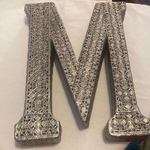 Silver decorative M.